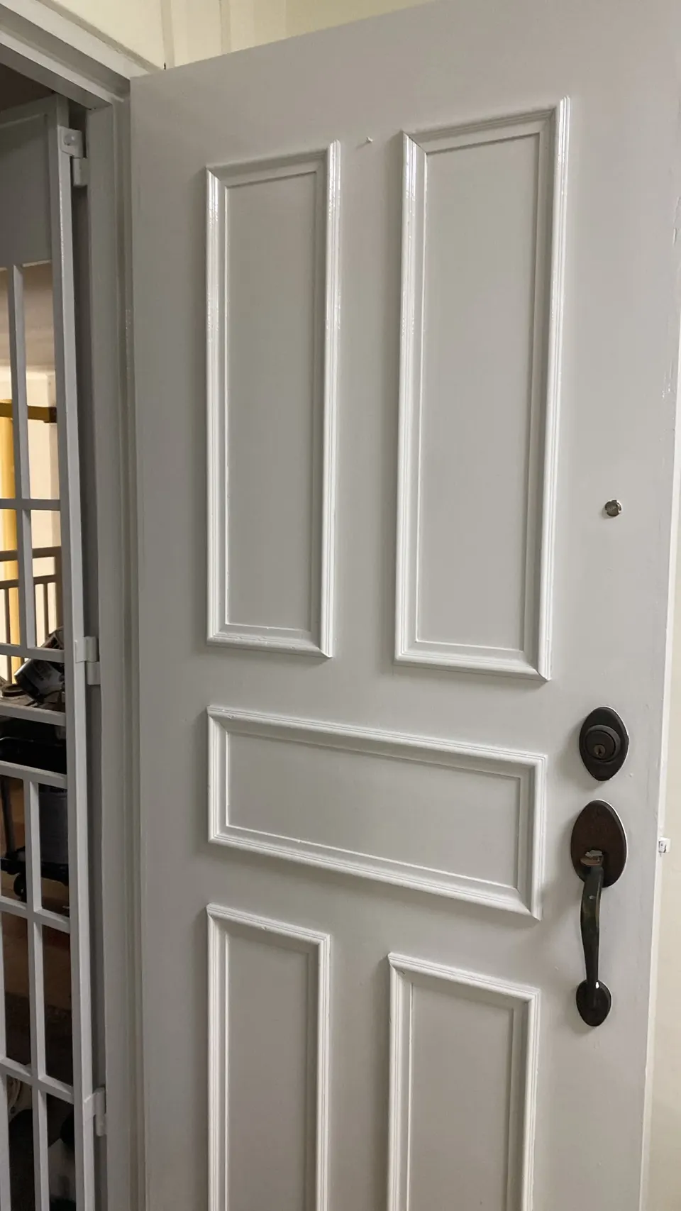 Main door repainted by LING-E in a satin white finish
